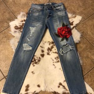 Boutique jeans. Embroidered flowers front and back